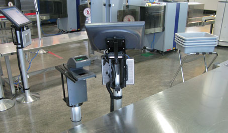 security-bpss-2 The trial system is deployed at the domestic PBS checkpoint at Montréal Trudeau, where bar code scanners were installed at the front of the queue and at each of the seven screening lines.