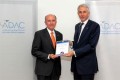 James Bennett, CEO, Abu Dhabi Airports Company, receives the Fast Travel Gold Award from Tony Tyler, IATA CEO.