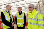 Andy Garner, Director Operational Readiness Heathrow – Olympics and Paralympics 2012; Jonathan Edwards, former Olympic gold medallist; and Norman Boivin, COO, Heathrow Airport at the Games Terminal ‘topping out’ ceremony.