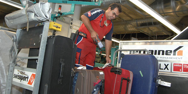 Baggage handler at Swissport. Baggage handler at Swissport.