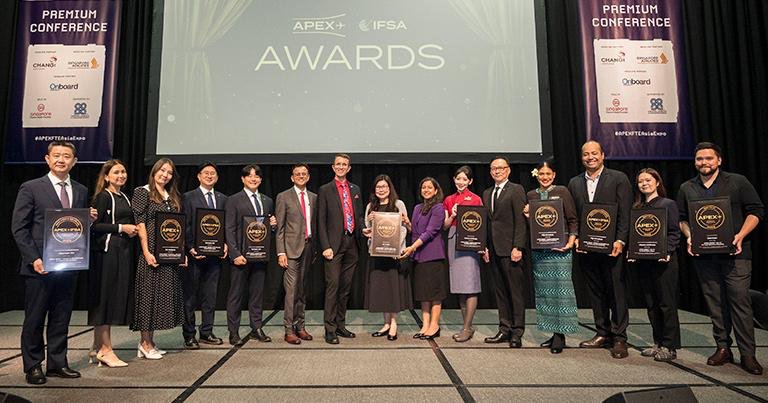 Winners celebrating on stage at the FTE APAC Pioneer Awards ceremony in Singapore