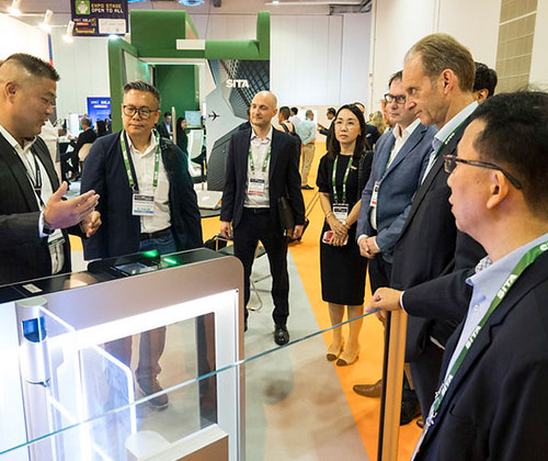 Guided Tech & Innovation Briefings tour exploring exhibition floor features