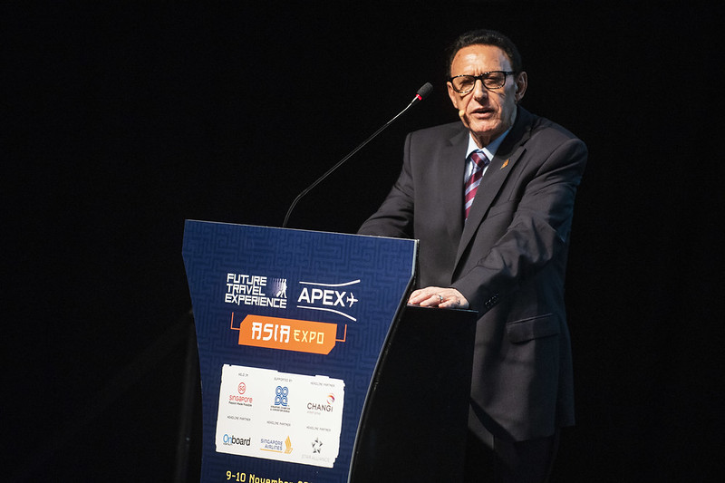 Speaker presentation on stage at APEX FTE EXPO conference
