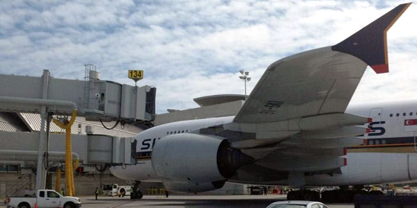The airline’s daily flight from Singapore arrived and docked at a gate to demonstrate how it would operate. The airline’s daily flight from Singapore arrived and docked at a gate to demonstrate how it would operate.