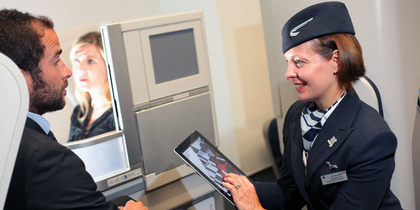 British Airways air hostess with an iPad.