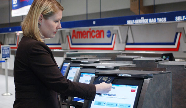American Airlines self-service bag tag kiosks