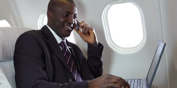 A passenger making use of in-flight Wi-Fi