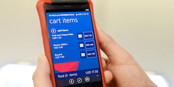 Passengers can now pay for their purchase via the handheld device.