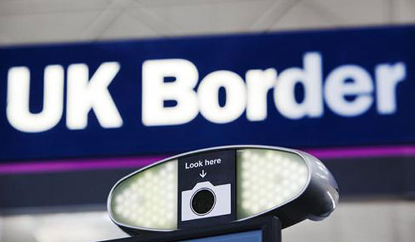 UK government considers immigration fast-track fee
