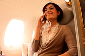 How will in-flight cell phone use impact the passenger experience?