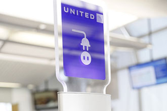 United to install 500 charging stations for personal electronic devices