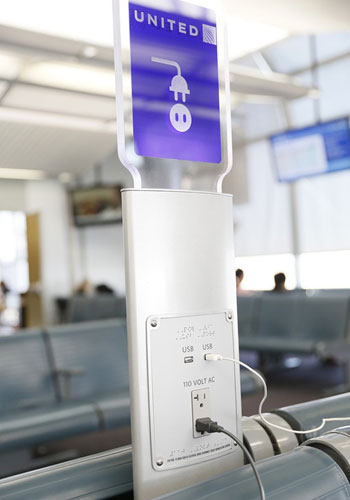 United to install 500 charging stations for personal electronic devices