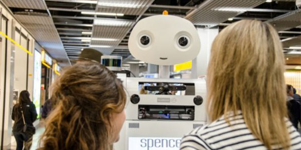 Amsterdam Airport Schiphol, Spencer scanned passengers’ boarding passes