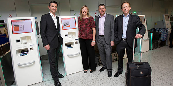 easyJet in front of some of the 48 Materna self-service bag drop units that have been installed in North Terminal