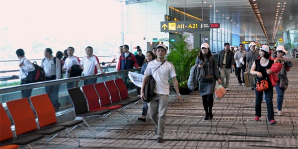 an automatic tray return system and a new body scanner machine are being trialled at Changi Airport