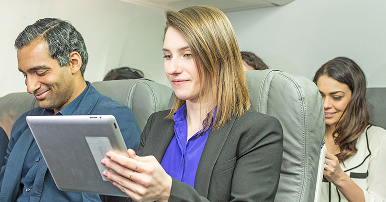 Photograph of a passenger using the Gogo service in-flight