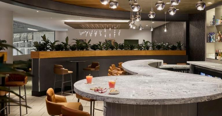 Louis Armstrong New Orleans Airport unveils newly renovated The Club MSY lounge